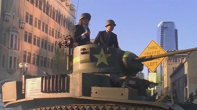 Teen Drives WWII Tank to Prom Escorted by Flaming Unipiper Dressed As Darth Vader